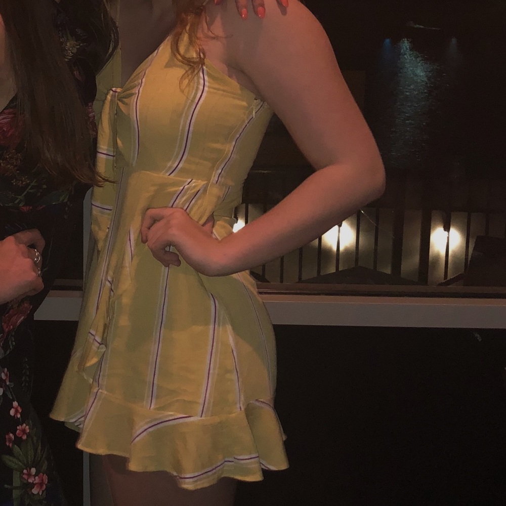 Yellow, red, and white striped dress with cutout tie in the front!